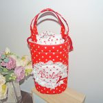 BOLSA ALMUERZO REDONDA ROJA DE ESTRELLAS